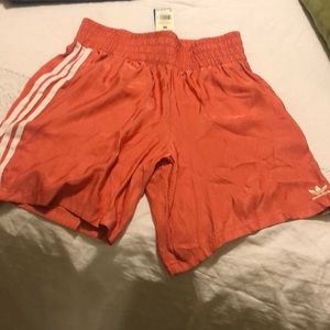 Brand new with tags red backslash coral Adidas satin shorts size medium